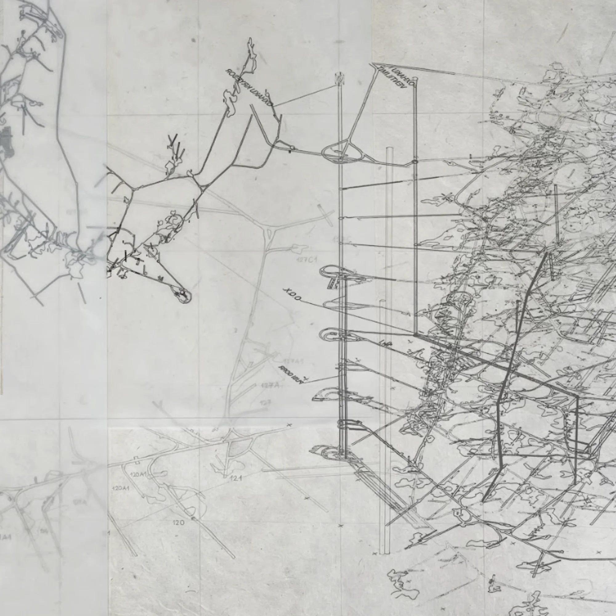Pencil drawings of the mine on overlapping pieces of tracing paper